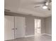 Primary bedroom with double closets and access to bathroom at 820 Bowman Ter, Port Charlotte, FL 33953