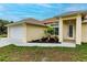House exterior, highlighting front door and walkway at 820 Bowman Ter, Port Charlotte, FL 33953