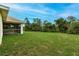 House with screened porch and large backyard at 820 Bowman Ter, Port Charlotte, FL 33953