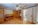 Bedroom with wood flooring and built-in shelving at 7263 Sablon Rd, North Port, FL 34291