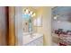 Small bathroom with vanity and mirror at 7263 Sablon Rd, North Port, FL 34291