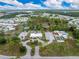 Aerial view of community amenities including tennis courts and pool at 6405 Kilohee Ct, North Port, FL 34287