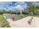 Well-maintained bocce ball courts with benches at 6405 Kilohee Ct, North Port, FL 34287