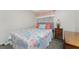 Bright bedroom featuring a double bed and bedside table at 6405 Kilohee Ct, North Port, FL 34287