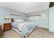 Comfortable bedroom with a king-size bed and ample natural light at 6405 Kilohee Ct, North Port, FL 34287