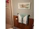 Clean bathroom with shower and wood-paneled walls at 6405 Kilohee Ct, North Port, FL 34287