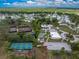 Aerial view of community amenities including tennis courts and pool at 6405 Kilohee Ct, North Port, FL 34287