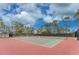 Two tennis courts with surrounding fencing at 6405 Kilohee Ct, North Port, FL 34287