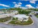 Aerial view of a manufactured home community showcasing a single-wide home at 6405 Kilohee Ct, North Port, FL 34287