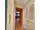 Hallway with view into living room and closet at 1629 Birchcrest Blvd, Port Charlotte, FL 33952