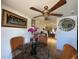 Bright dining area with glass top table and kitchen view at 1629 Birchcrest Blvd, Port Charlotte, FL 33952