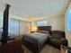 Bedroom with large bed, closet and TV at 1629 Birchcrest Blvd, Port Charlotte, FL 33952