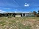 House exterior view showcasing a single-story home at 1629 Birchcrest Blvd, Port Charlotte, FL 33952