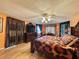 Main bedroom with king bed, dresser, and window at 1629 Birchcrest Blvd, Port Charlotte, FL 33952