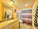 Bathroom with shower/tub, vanity, and granite countertop at 1629 Birchcrest Blvd, Port Charlotte, FL 33952