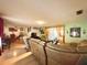 Open concept living and dining area with hardwood floors at 1629 Birchcrest Blvd, Port Charlotte, FL 33952