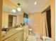 Bathroom with vanity, shower, and granite countertop at 1629 Birchcrest Blvd, Port Charlotte, FL 33952