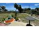 Landscaped backyard with fountain and patio area at 1629 Birchcrest Blvd, Port Charlotte, FL 33952