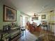 Dining area with wood table and chairs near kitchen at 1629 Birchcrest Blvd, Port Charlotte, FL 33952