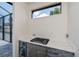 Outdoor kitchen with stainless steel appliances and stone countertops at 11 Pinehurst Ct, Rotonda West, FL 33947