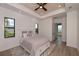 Main bedroom with ensuite bathroom access and a tranquil view at 11 Pinehurst Ct, Rotonda West, FL 33947