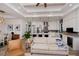 Open living room showcasing a comfortable couch and a view into the kitchen at 11 Pinehurst Ct, Rotonda West, FL 33947