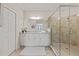 Bathroom with a large walk-in shower and granite vanity at 15999 Grassland Ln # 3221, Punta Gorda, FL 33982