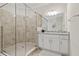 Bathroom with walk-in shower and granite countertop vanity at 15999 Grassland Ln # 3221, Punta Gorda, FL 33982