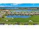 Aerial view of the community highlighting the property's water view at 15999 Grassland Ln # 3221, Punta Gorda, FL 33982