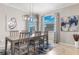 Bright dining room with a large table and window views at 15999 Grassland Ln # 3221, Punta Gorda, FL 33982