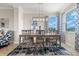 Elegant dining room featuring a large table and statement lighting at 15999 Grassland Ln # 3221, Punta Gorda, FL 33982