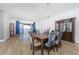 Bright dining room featuring hardwood floors and bay views at 85 Vivante Blvd # 8534, Punta Gorda, FL 33950
