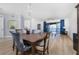 Elegant dining room with hardwood floors and water views at 85 Vivante Blvd # 8534, Punta Gorda, FL 33950