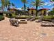Relaxing fire pit area with seating and brick pavement at 85 Vivante Blvd # 8534, Punta Gorda, FL 33950