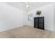 Bright bedroom with neutral carpeting and large window at 85 Vivante Blvd # 8534, Punta Gorda, FL 33950