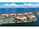 Aerial view showcasing a luxurious waterfront community with resort-style amenities at 85 Vivante Blvd # 8534, Punta Gorda, FL 33950