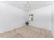 Spacious bedroom with neutral carpeting and ceiling fan at 85 Vivante Blvd # 8534, Punta Gorda, FL 33950