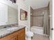 Bathroom with granite vanity and shower/tub combo at 85 Vivante Blvd # 8534, Punta Gorda, FL 33950