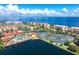 Aerial view of community with waterfront access and tennis courts at 85 Vivante Blvd # 8534, Punta Gorda, FL 33950