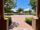 Brick courtyard with view of water and other homes at 85 Vivante Blvd # 8534, Punta Gorda, FL 33950