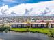 Aerial view of waterfront condo building from another angle at 85 Vivante Blvd # 8534, Punta Gorda, FL 33950