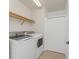 Laundry room with washer, dryer, and storage at 85 Vivante Blvd # 8534, Punta Gorda, FL 33950