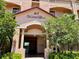 Condo building entrance with address and landscaping at 85 Vivante Blvd # 8534, Punta Gorda, FL 33950