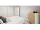 Bright bedroom with queen bed, dresser, and spacious closet at 10429 New Brittain St, Port Charlotte, FL 33981