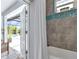 Bathroom with a view of the pool from the shower at 9978 Audrey St, Port Charlotte, FL 33981