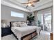 Spacious main bedroom with sliding glass doors to patio at 9978 Audrey St, Port Charlotte, FL 33981