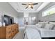 Main bedroom with ensuite bathroom and a dresser at 9978 Audrey St, Port Charlotte, FL 33981