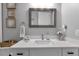 Bathroom vanity with quartz countertop and decorative accents at 9978 Audrey St, Port Charlotte, FL 33981