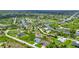 Aerial view of waterfront homes and community landscape at 9978 Audrey St, Port Charlotte, FL 33981
