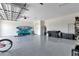 Spacious garage with epoxy flooring and storage at 9978 Audrey St, Port Charlotte, FL 33981